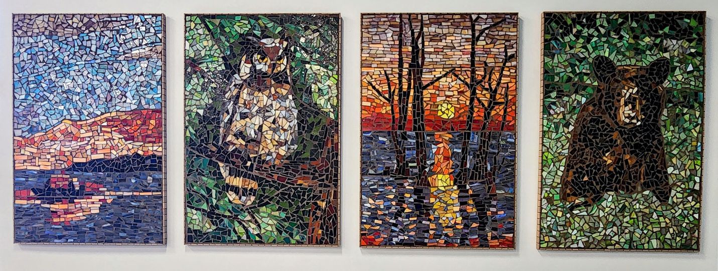 Four mosaic panels each showing a nature inspired image. Brightly colored sunset water scape with boat, barred owl on tree branch, sunset through tree shadows, bear cub in green grass.